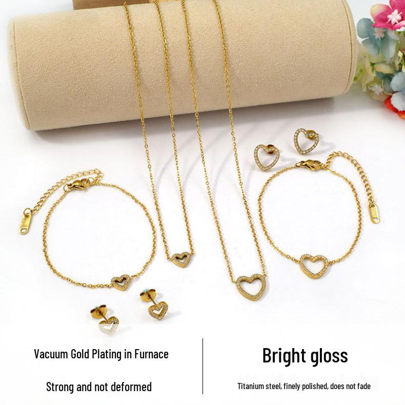 European Diamond-Accented Heart Jewelry Set: Necklace, Bracelet & Earrings in Titanium Steel for Women's Luxurious Style.