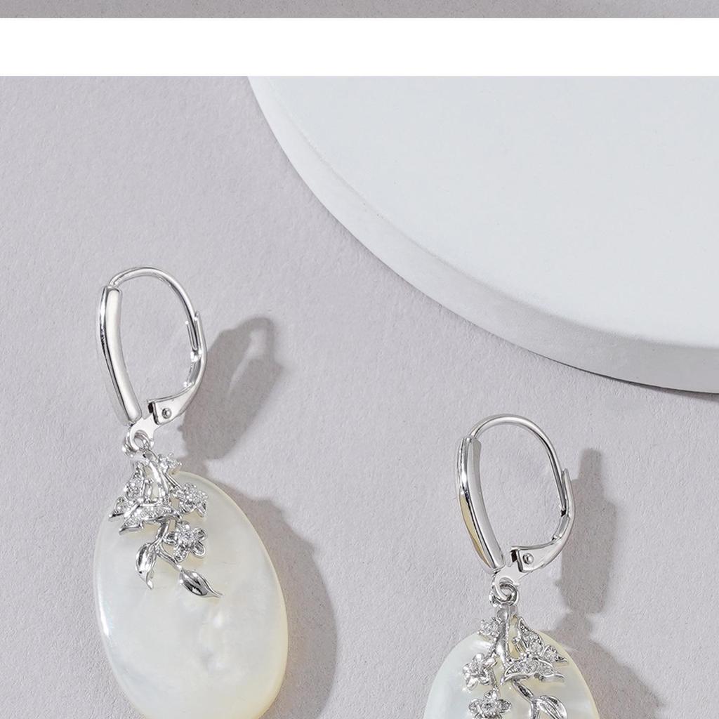 Exquisite Mother-of-Pearl Sterling Silver Luxury Earrings with Unique Face-Inspired Design