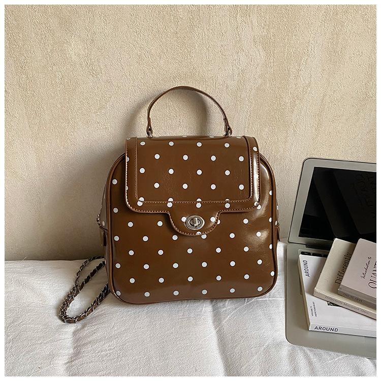 Schoolbag1011 Korean fashion portable Boston bag new niche design simple shoulder women's bag polka dot messenger bag