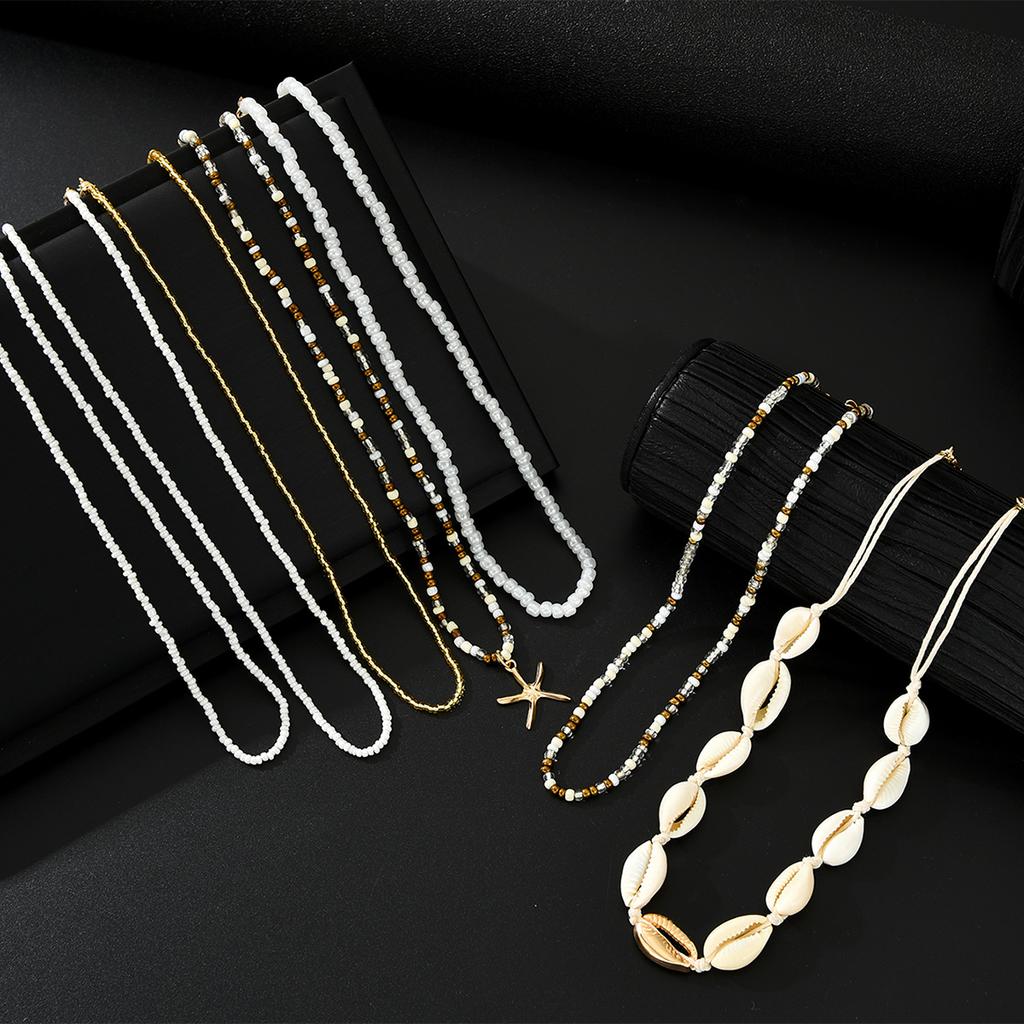 7Pcs/Set Boho Starfish Conch Rice Beads Pendant Necklace for Women Fashion White Color Multi layered Necklace Set Summer Jewelry