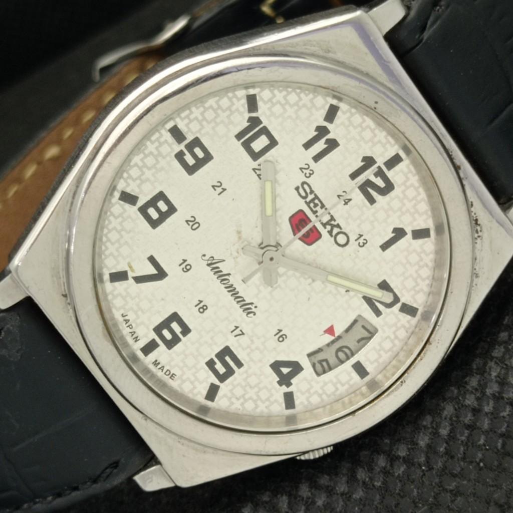 

Б/У винтажные мужские часы SEIKO 5 AUTOMATIC 7009A из Японии с серебряным механизмом и датой 595a-a312307-2 SKU595a-a312307