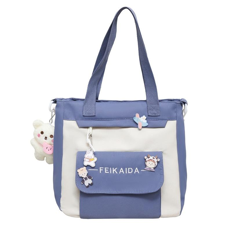 

Шкільний жіночий нейлоновий рюкзак для учнів середньої школи Кольоровий кампусний рюкзак великої місткості handbag синій