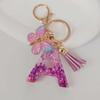 Purple Iridescent Resin Letter Keychain with Butterfly Tassel