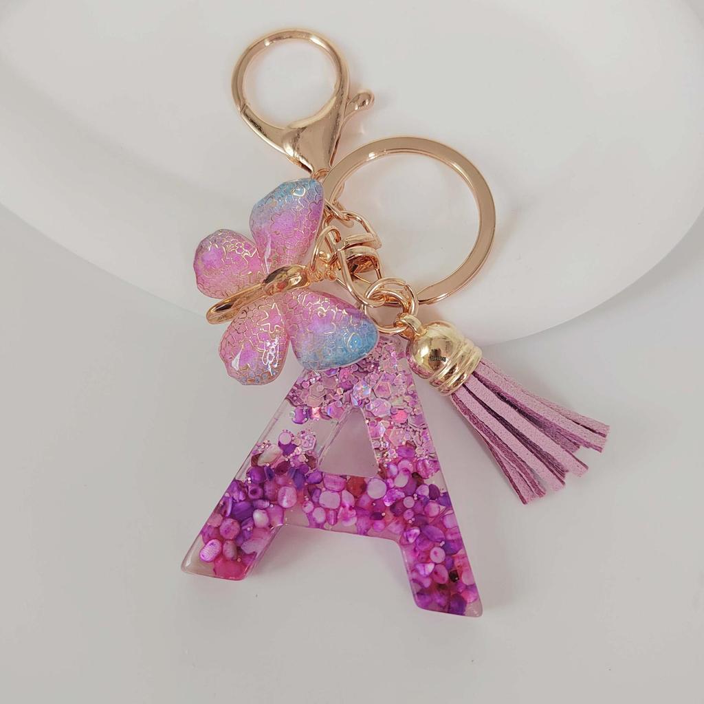 Purple Iridescent Resin Letter Keychain with Butterfly Tassel