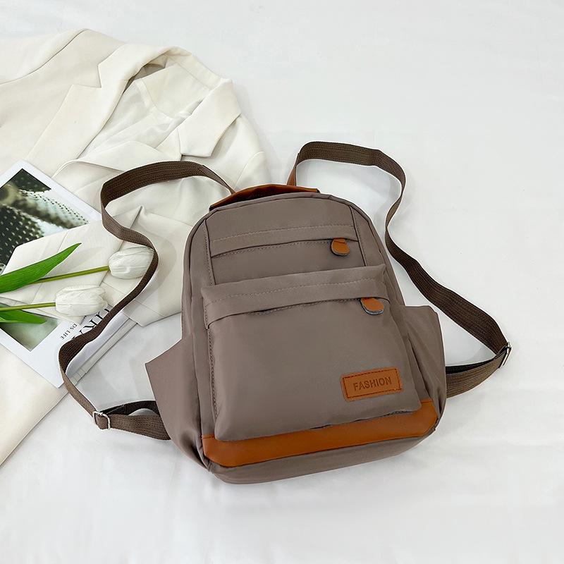 

2025 новый стильный простой рюкзак для отдыха и путешествий, легкий, женский, маленький школьный рюкзак, рюкзак для студента колледжа