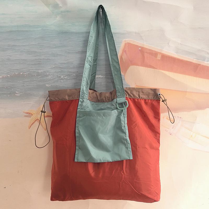 Eco-Friendly Foldable Shopping Tote with Buckle, Drawstring Closure, and Single Shoulder Strap