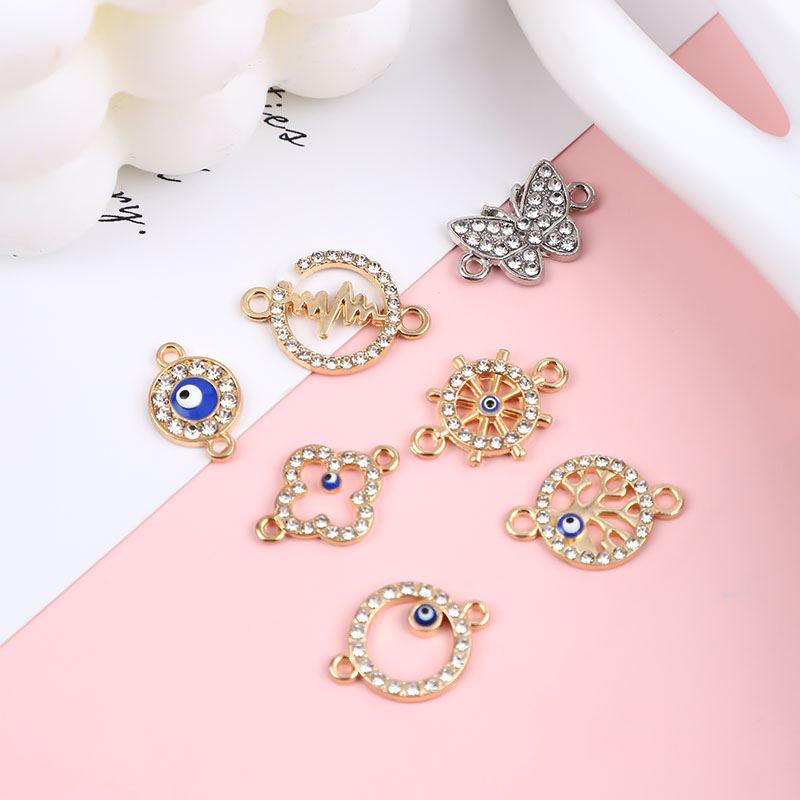 

Alloy Rhinestone Blue Eyes Butterfly Double Hook Pendant in Various Styles