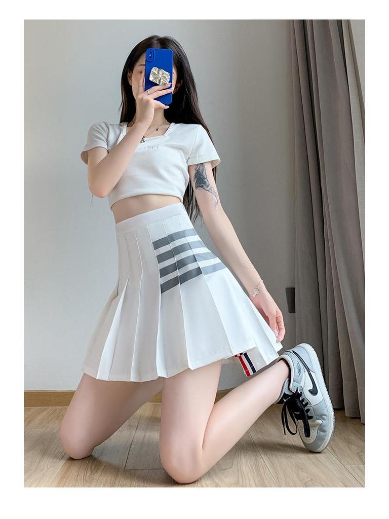 Wang Xinling High-Waisted Pleated Skirt: Short Front, Long Back, 4-Stripes, Slimming A-Line Mini Skirt.