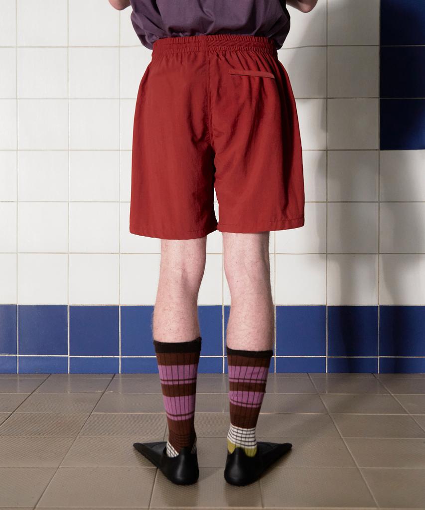 UNALLOYED Logo Nylon Shorts / Brick