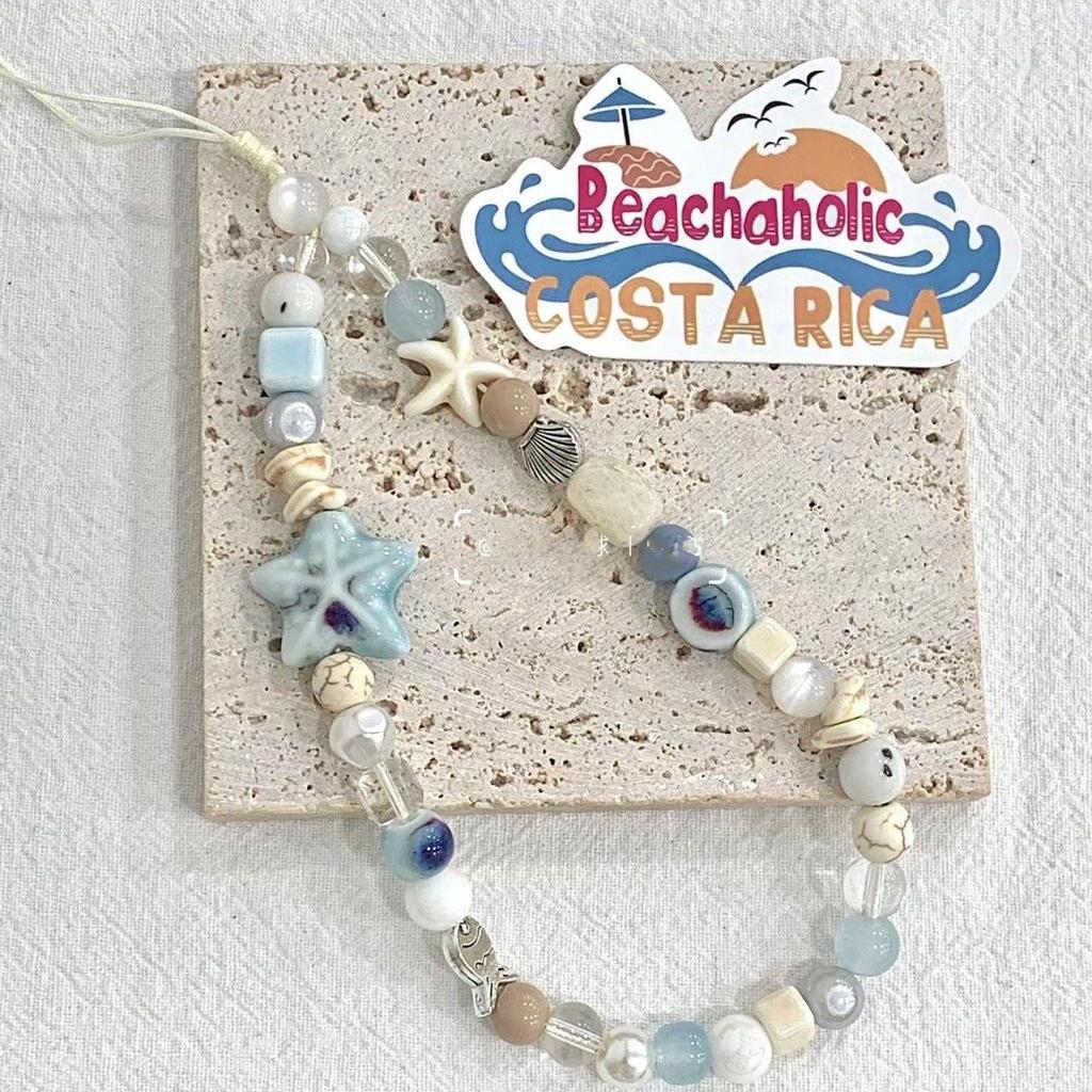 DIY pequeño lazo de cristal fresco flores amor pulsera de perlas amor de las mujeres cadena de teléfono móvil anti-caída accesorios de carcasa de teléfono móvil