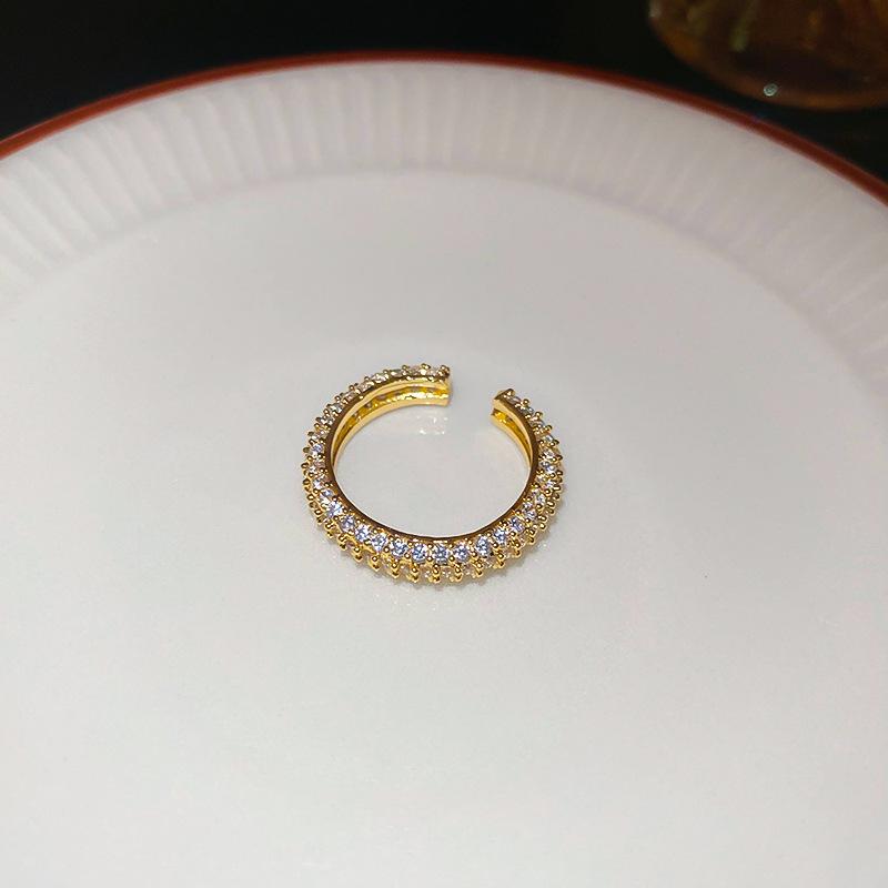 Real gold electroplated zircon twist opening ring women's niche high-end ring versatile fashion light luxury jewelry wholesale
