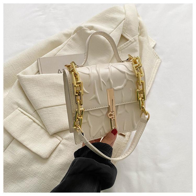 Borsa a tracolla alla moda in stile urbano in pelle PU con catena, piccola borsa morbida in più colori