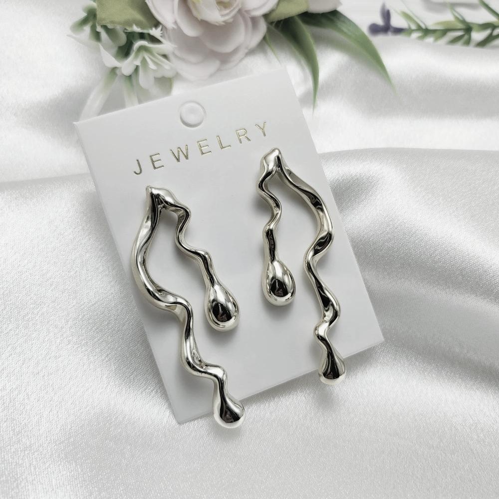 

Irregular Liquid Water Droplet CCB Golden Long Drop Earrings for Women Simple Personality Exaggerated Smooth Creative Zircon