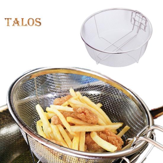 Stekekurv i rustfritt stål med håndtak Rund stekekurv på kjøkken for pommes frites Løkringer stekt kylling