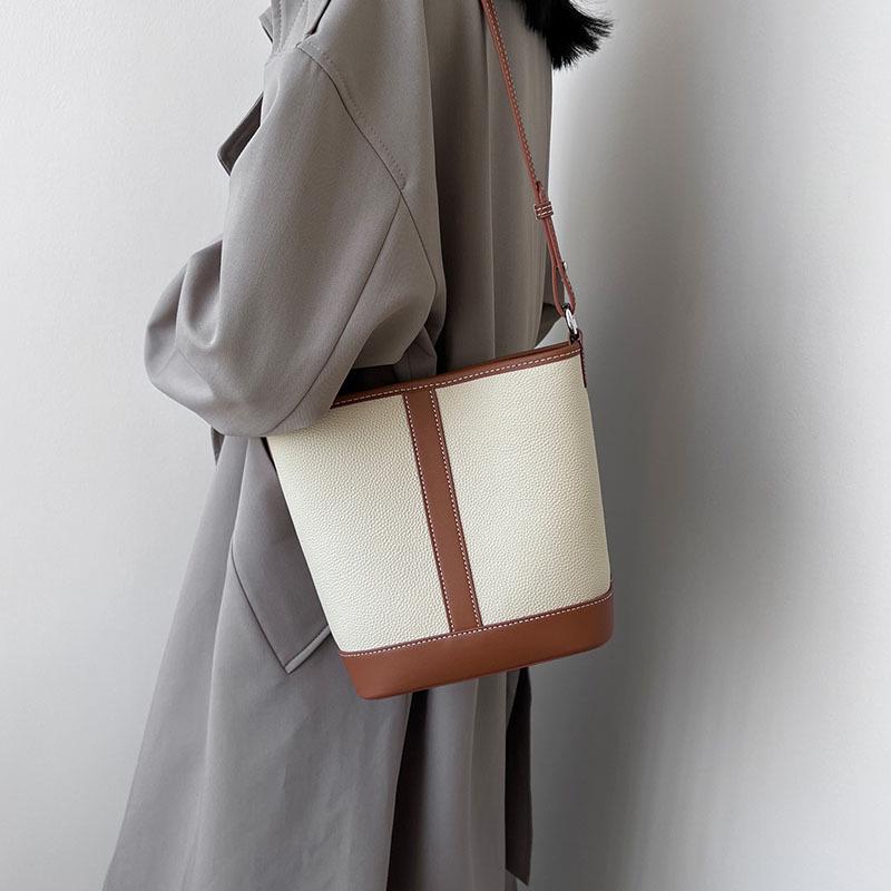 

Элегантная сумка-ведро TB из высококачественной кожи 2025 года: Женская сумка-мессенджер из коровьей кожи премиум-класса