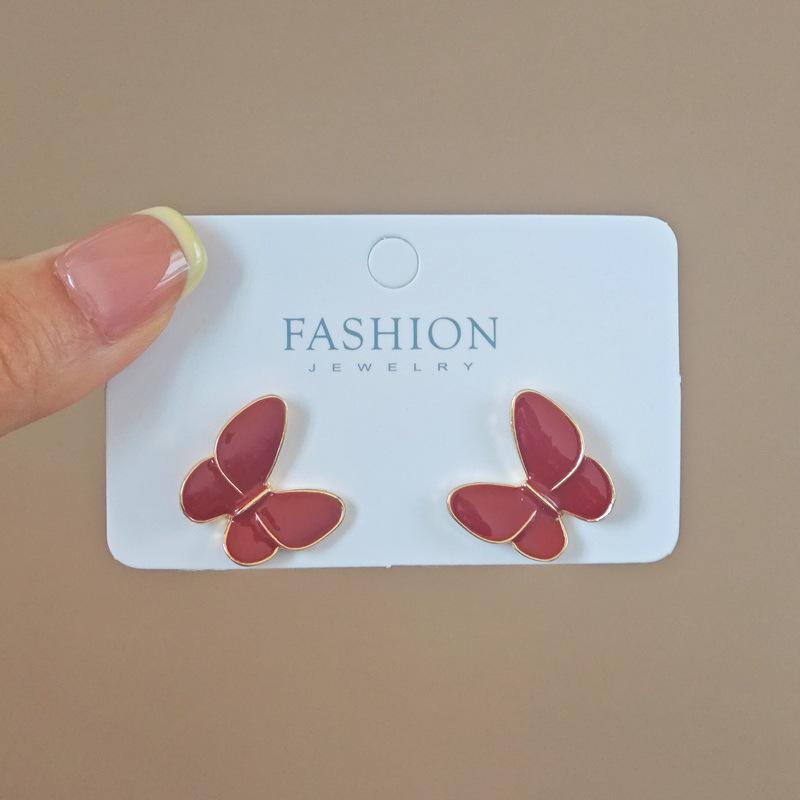 Orecchini Rossi Borchiati alla Moda Stile Hong Kong 2025 per Donna: Moda Elegante Autunno/Inverno di Alta Gamma
