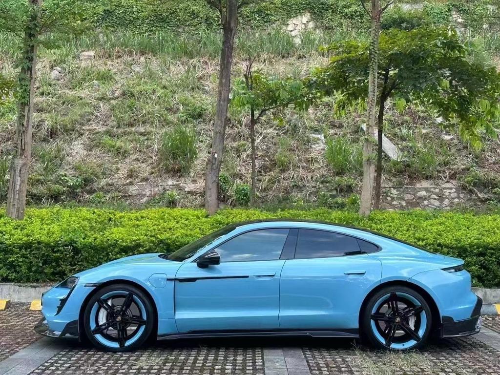 Taycan Mansory-Style Carbon Fiber Body Kit: Front Lip, Side Skirts, Rear Lip, Tail Wing, Wind Deflectors.