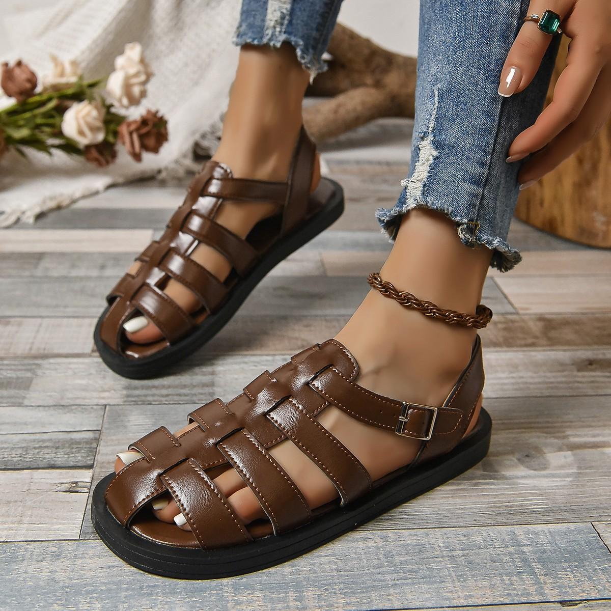 

Sandals female popular new summer woven muffin flat shoes casual simple hollow flat heel fairy Roman shoes female 42 малиновий