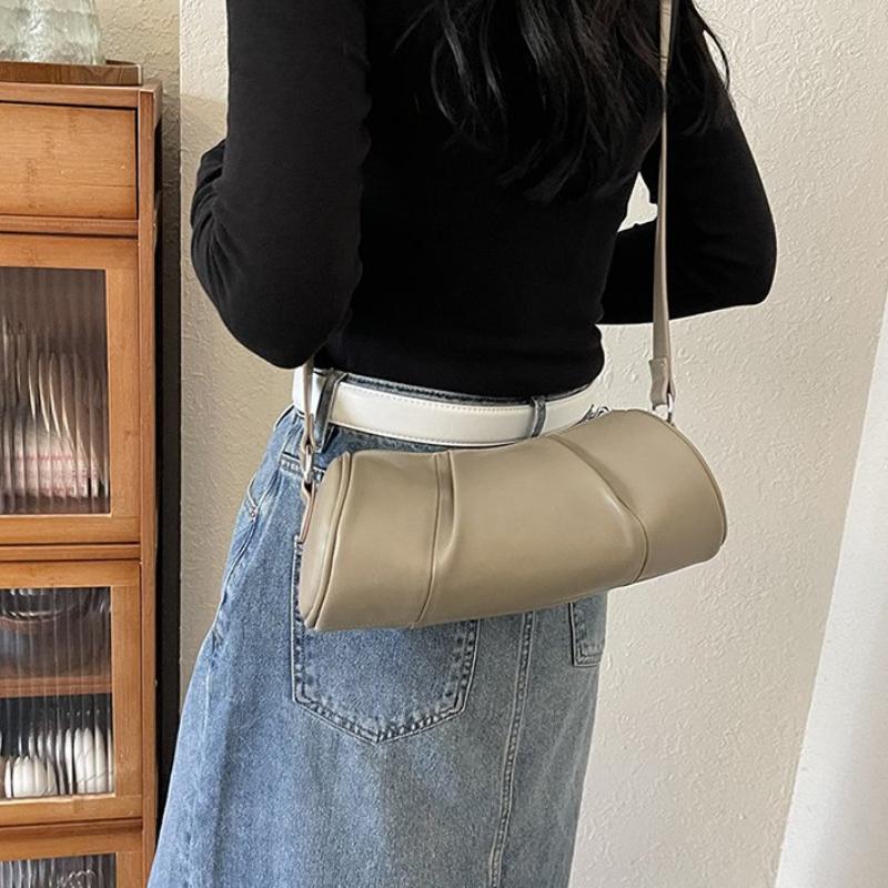 Retro cylindrical shoulder bag for women  crossbody bag  versatile cushion  solid color  high quality  niche  casual  new