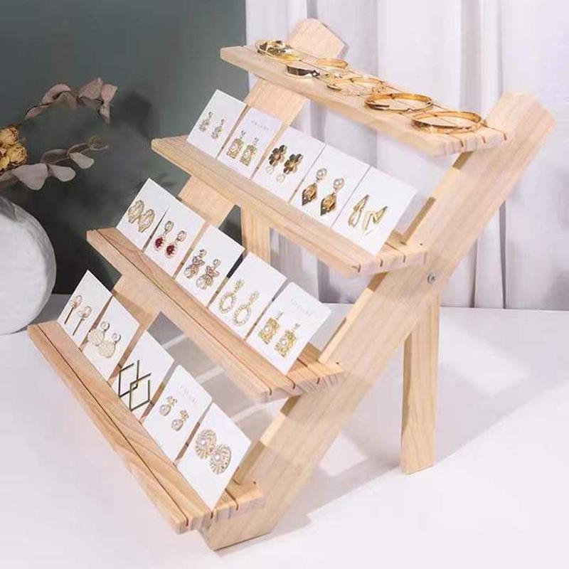 Flerlags utstillingsstativ Loggring Øredobbknapp Utstillingsstativ Avtakbart Øredobbkort Smykkestativ Dukkehånd Visning