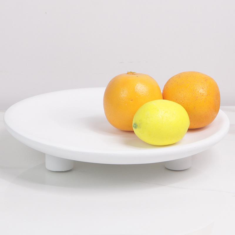 Modernes minimalistisches Musterhaus Obstteller Nordische kreative dreibeinige Schale Esstisch Weiche Dekoration Ausstellungshalle Aufbewahrungsornamente