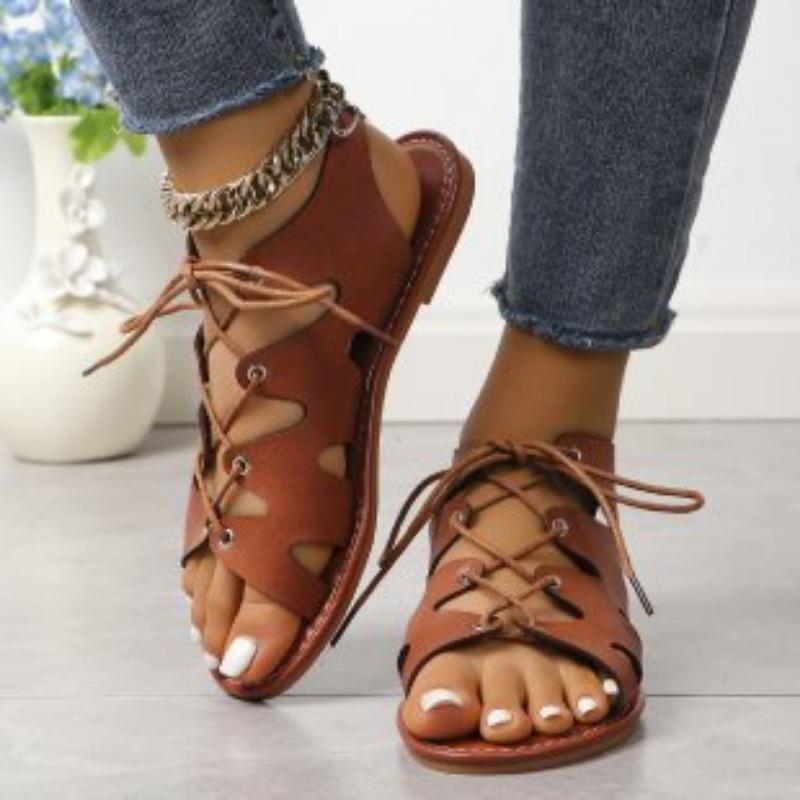 Flat open-toed crossed thin strap cool slippers women's new fringed shoes hollow women's sandals