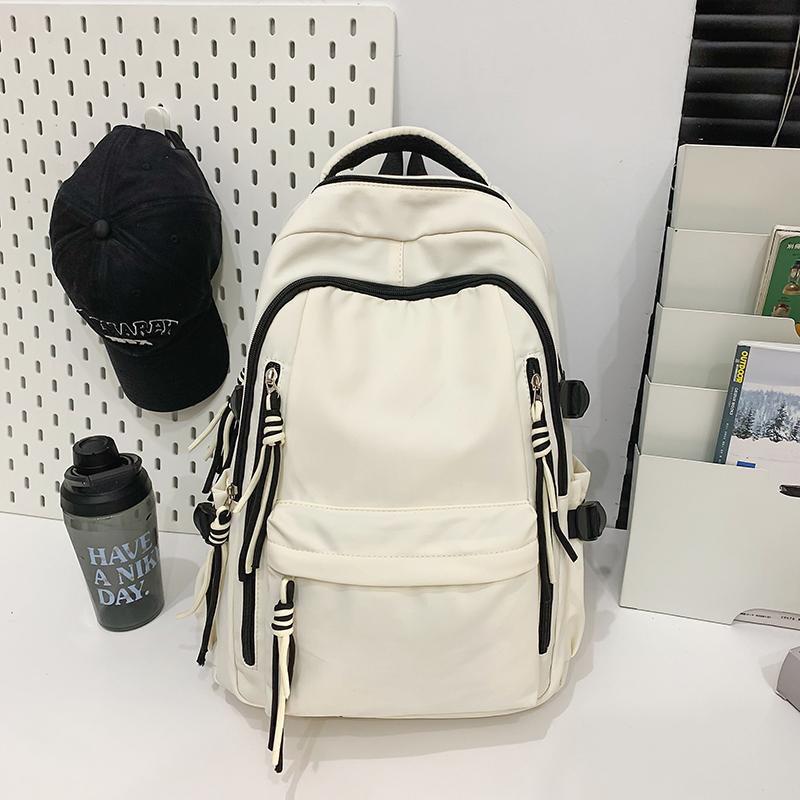 Ryggsäck för män i enfärgat utförande Ryggsäck för kvinnor med flera fickor Stor kapacitet Student Skolväska