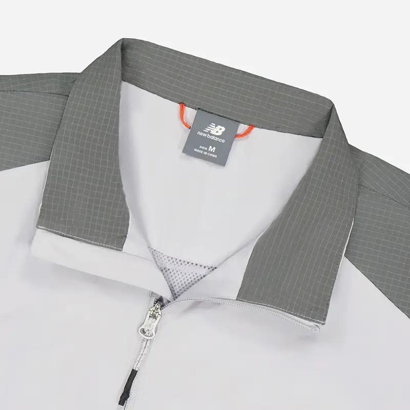 New Balance Giacche Uomo Grigio Revers Moderato Altro NAF33081-LGR