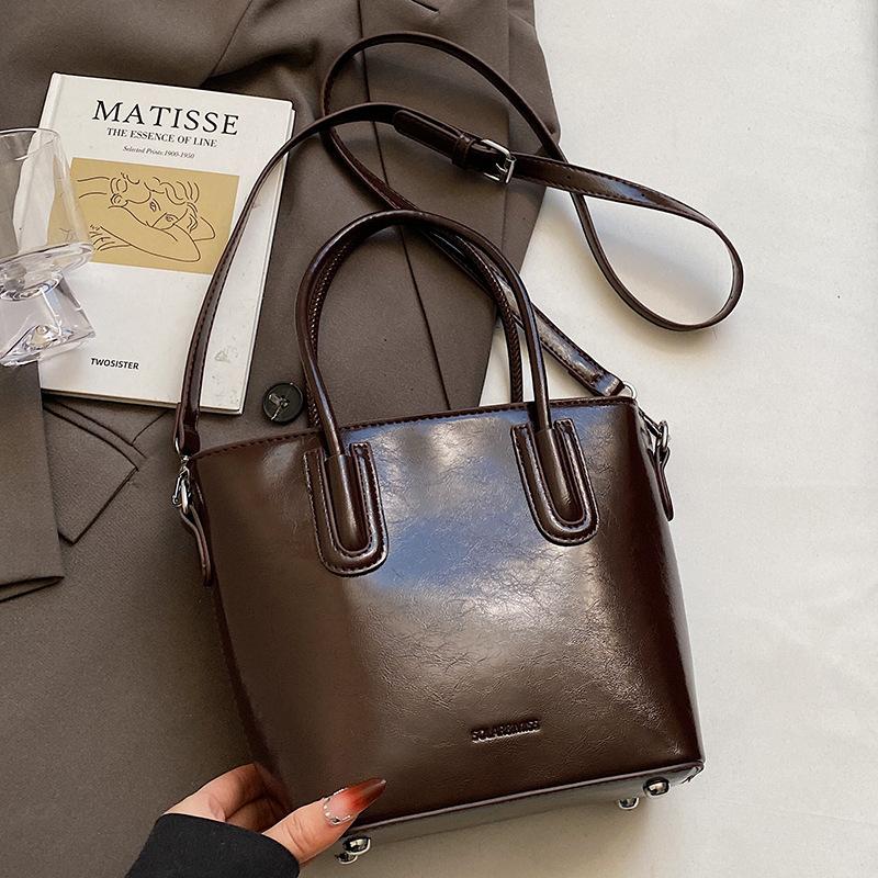 

Wholesale Trend New Product Fashion Simple Wind Portable Bucket Bag Women s Premium Sense Commuter Versatile Work Messenger Bag