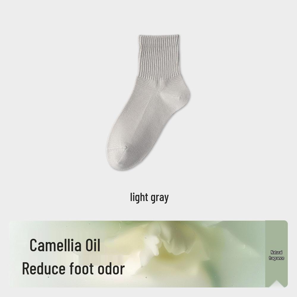 Women's Mid-Calf Camellia Essential Oil Antibacterial Cotton Socks - Solid Color, High Elasticity, for Spring & Autumn