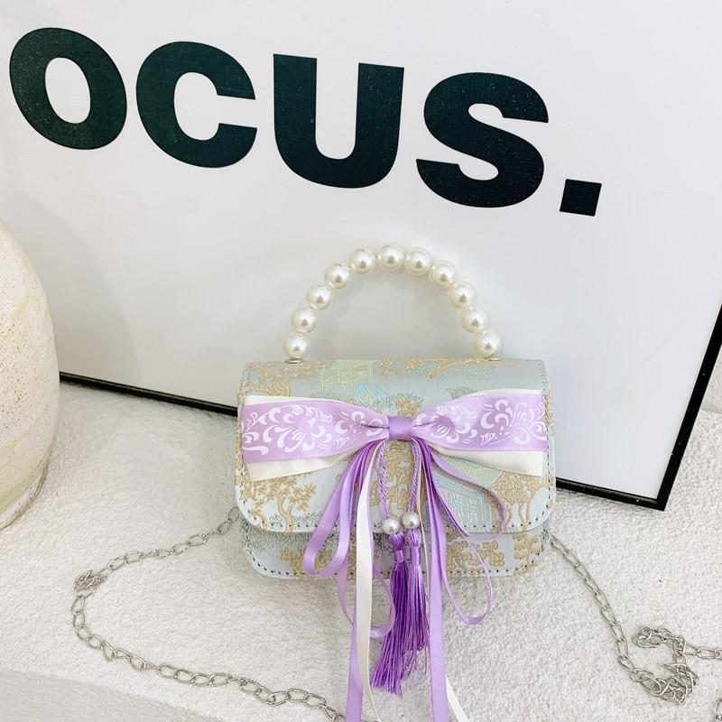 And Versatile Elegant Childrens Handbag With Chic Chain Detail And Charming Scenery Print