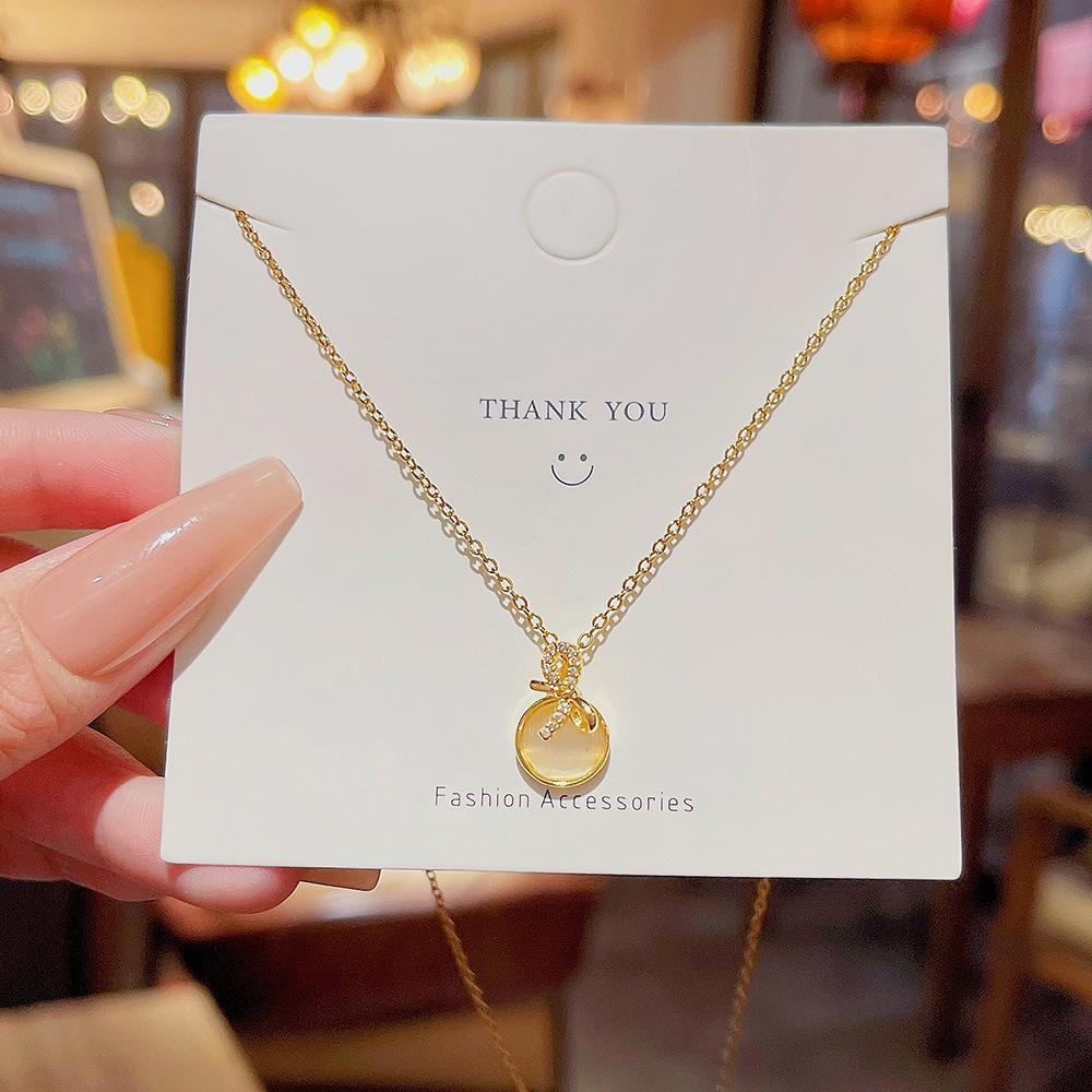 Online celebrity bow necklace titanium steel simple personality design sense Opal clavicle chain hot accessories.