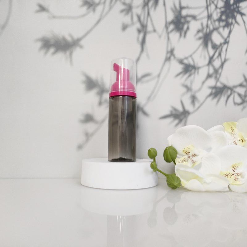 Available 60ml Transparent Black Foam Mousse Bottle for Face Wash and Travel-friendly Cosmetic Packaging.