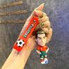 Zachte Rubberen Voetballer Figuurtje Sleutelhanger met Voetbalprint Bandje voor Tassen Rugzakken en Sleutels