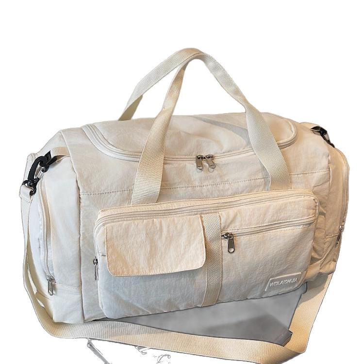 Large Capacity Waterproof Lightweight Travel Bag for Men and Women - Fashionable Handheld Storage for Short Trips and Sports.