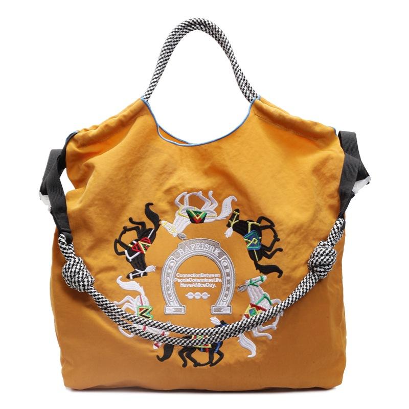 Literary small fresh embroidery pony contrasting color large capacity women's armpit bag new women's shoulder messenger bag