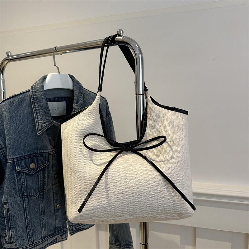 Casual commuting large-capacity striped cotton and linen bag women's new versatile shoulder bag portable tote bag