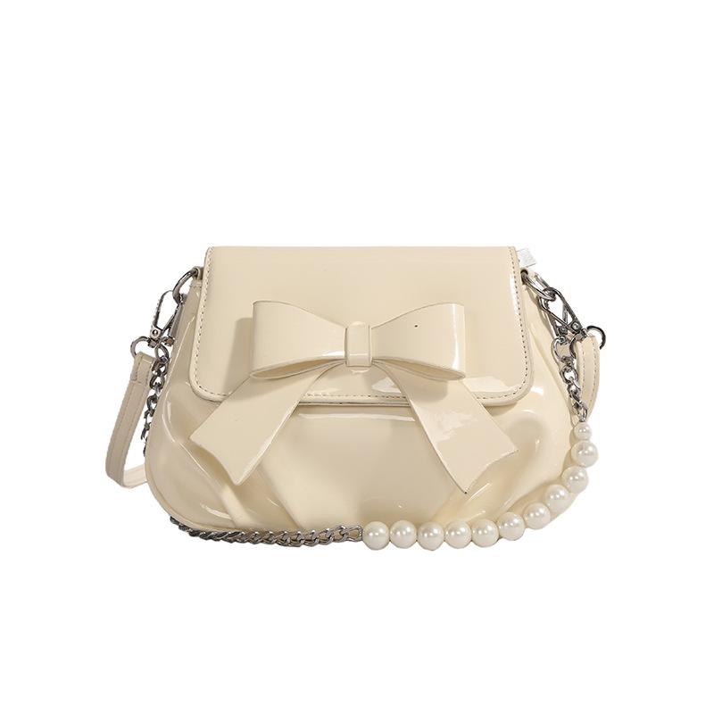 This year, French sweet style bow chain small bags are popular, fashionable and versatile, foreign style and advanced sense messenger women's bags.