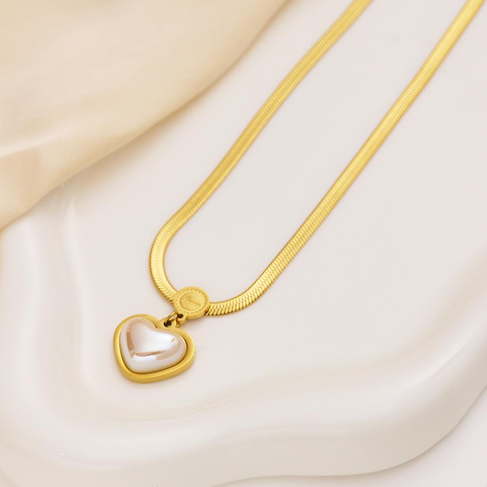 Heart Pendant Titanium Steel Necklace - Clavicle Chain with Light Luxury Peach Heart Design
