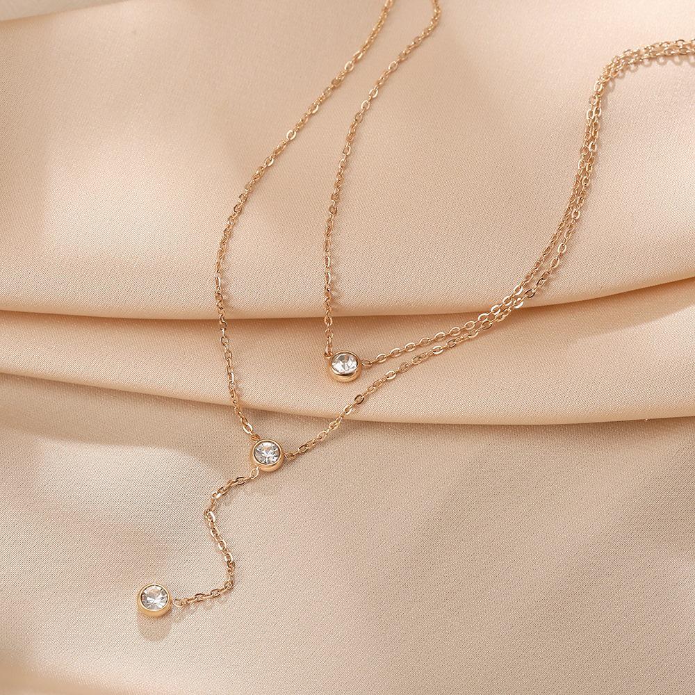 Elegant Minimalist Double-Layer Diamond Tassel Necklace – High-End Titanium Steel Clavicle Chain for Women