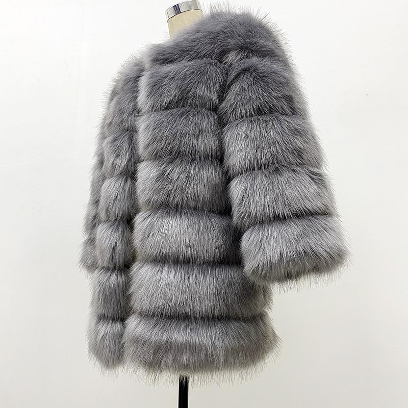 Seven-section splicing jacket women's new autumn and winter clothing temperament fashionable artificial fur imitation fox hair thermal coat