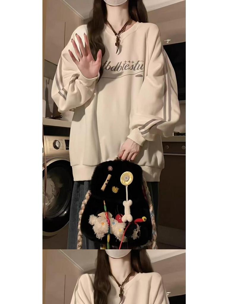 Bluza damska w paski z dekoltem w serek - Kolekcja Wiosna/Jesień 2024