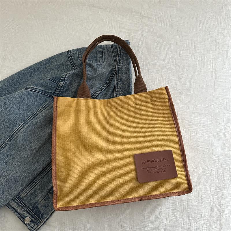 2025 summer new literary and artistic large-capacity class shoulder portable messenger bag casual simple canvas women's bag