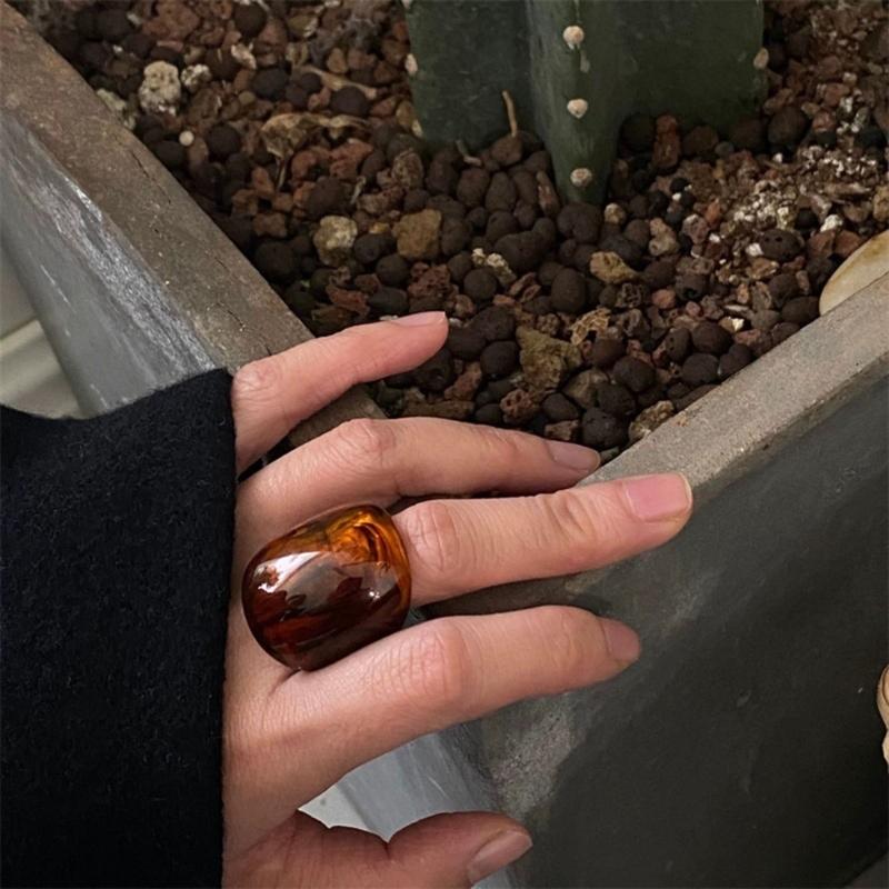 Fashionable Resin Jewelry Ring Featuring Deep Amber Shade Versatile Accessory For Casual Or Formal Outfits