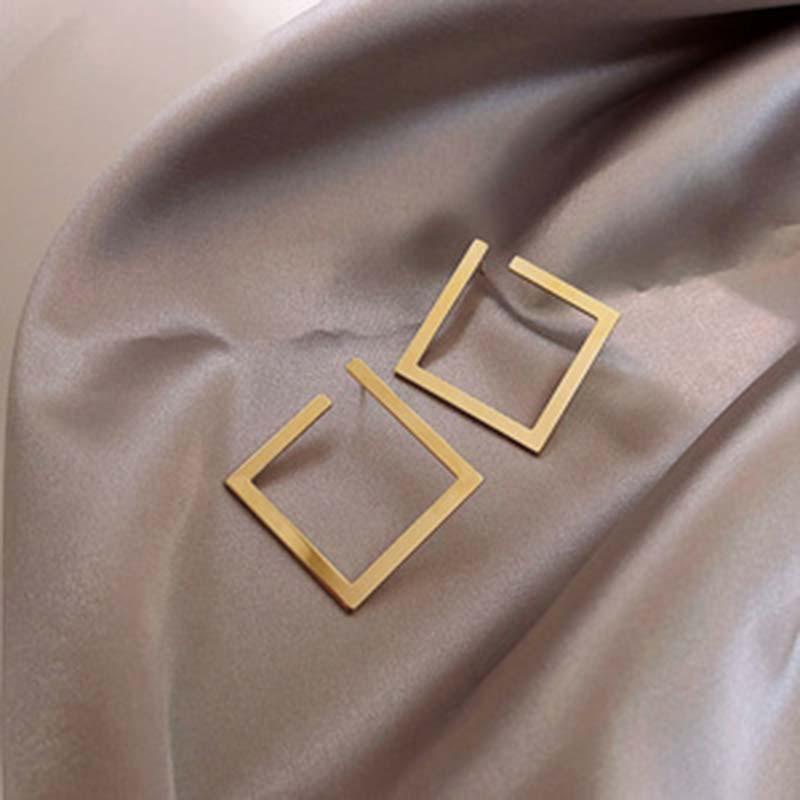 Metal wind round geometric earrings niche simple versatile stud earrings ins fashion high-end earrings
