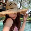 Elegant Raffia Sun Hat With Wide Brimmed And Breathable Openwork Design For Beach Vacation And Outdoor Activities