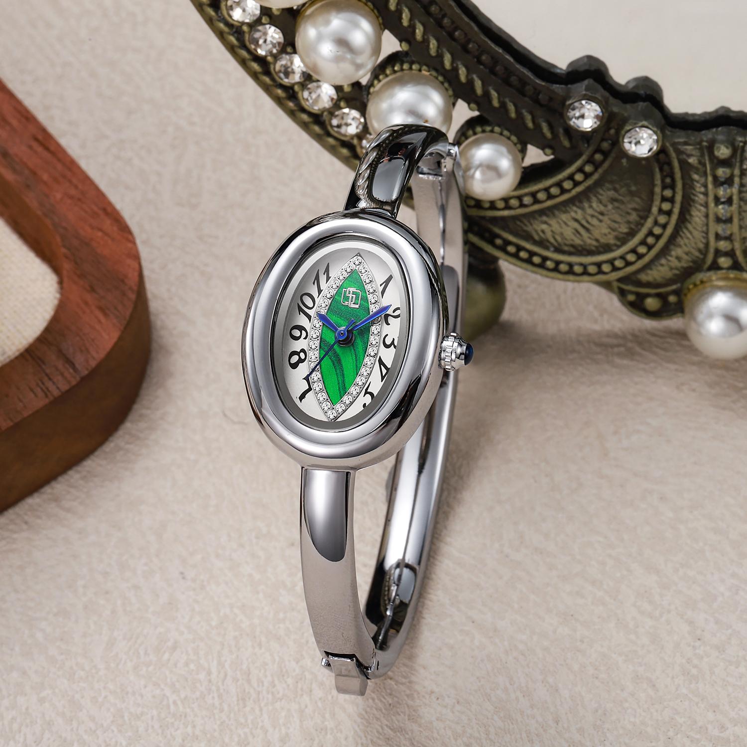 

luxury elegant ladies bracelet watch eye pupil Arabic numeral dial inlaid with diamond oval waterproof women quartz watch Reloj