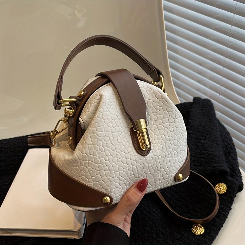 Luxury color-blocked crossbody bag, high-quality feel, stylish Western retro handbag, simple and suitable for commuting, elegant shoulder bag.