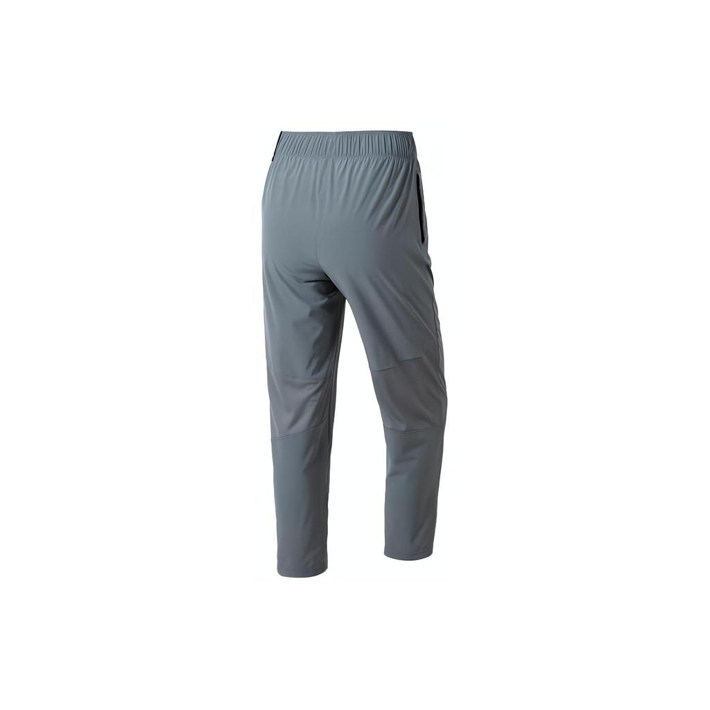Nike Women's Dri-FIT Fast Mid-Rise 7/8 Tapered Running Pants Smoke Grey FB7030-084