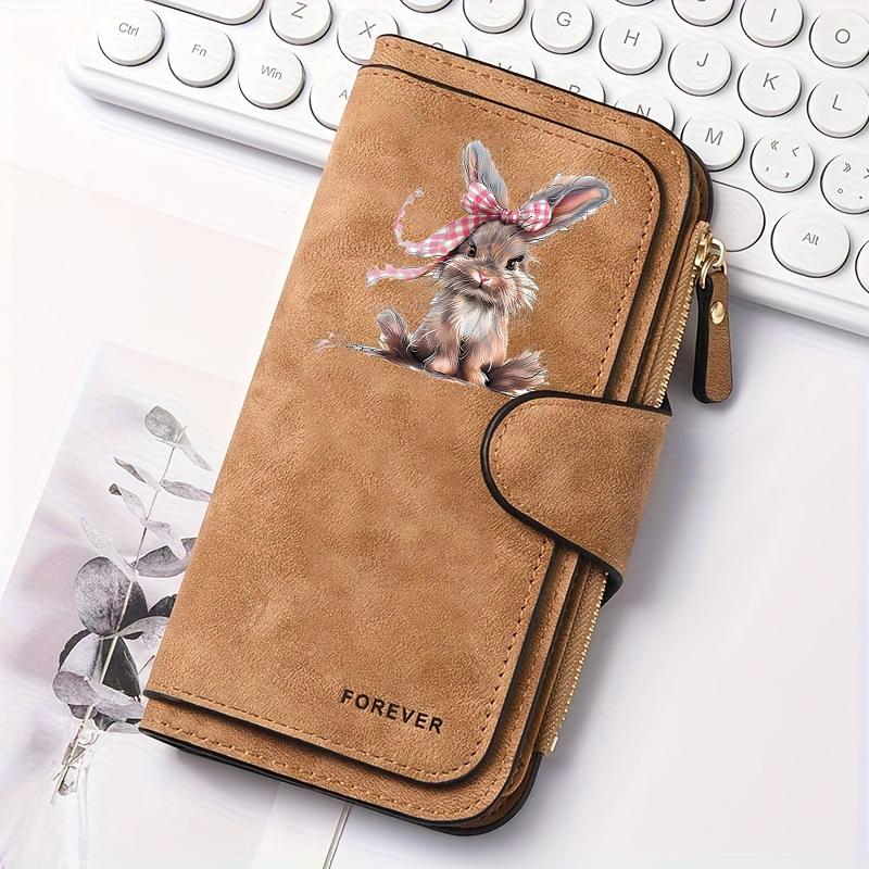 Easter Bunny Women's Long Wallet features a flip cover design. This multifunctional wallet is perfect for Easter celebrations and comes with a